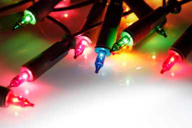 46785599 – closeup of christmas lights glowing