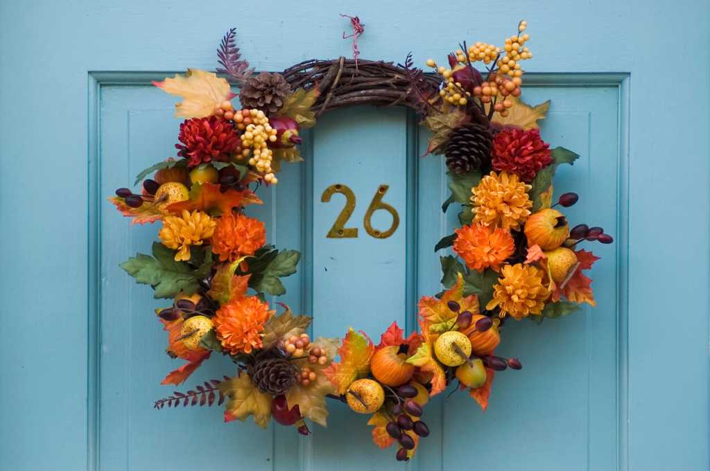 Thanksgiving wreath hanging on residential door