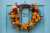 Thanksgiving wreath hanging on residential door