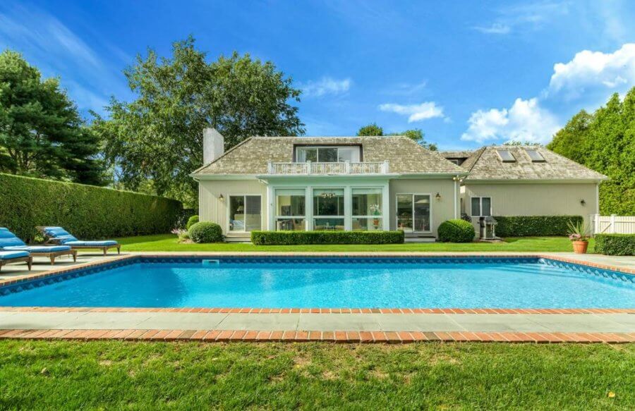 Open Houses Waterfront Westhampton Home Has a Dock, Pool, and Other Outdoor Amenities Behind
