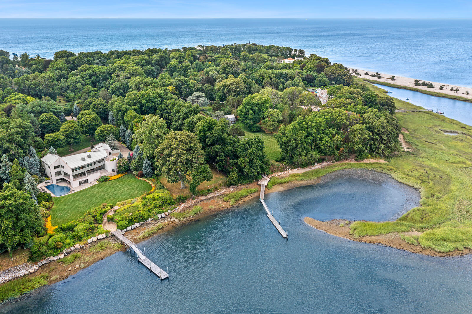 Contemporary Old Field Home Expertly Placed for Water Views