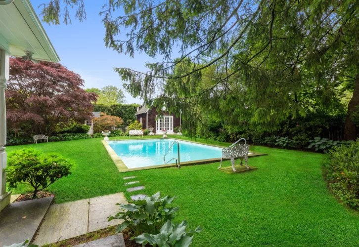 The spacious backyard and luxurious heated pool, 55 Post Crossing, Southampton, Southampton home for sale, victorian, pool, wrap-around porch, spacious, modern, vintage