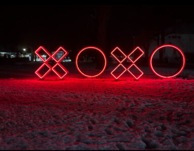 XOXO sculpture in Southampton at night