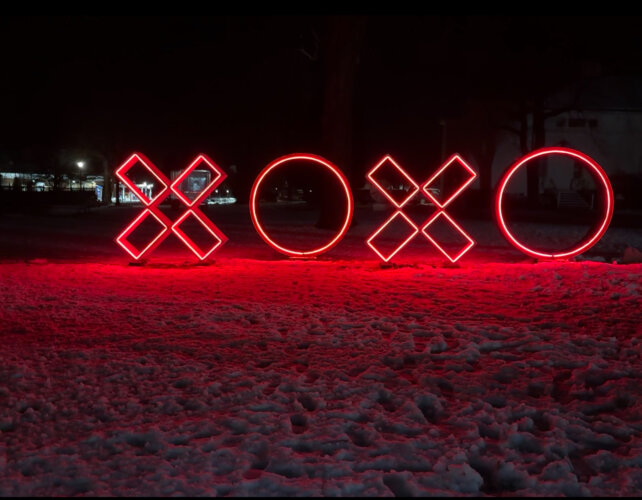 XOXO sculpture in Southampton at night