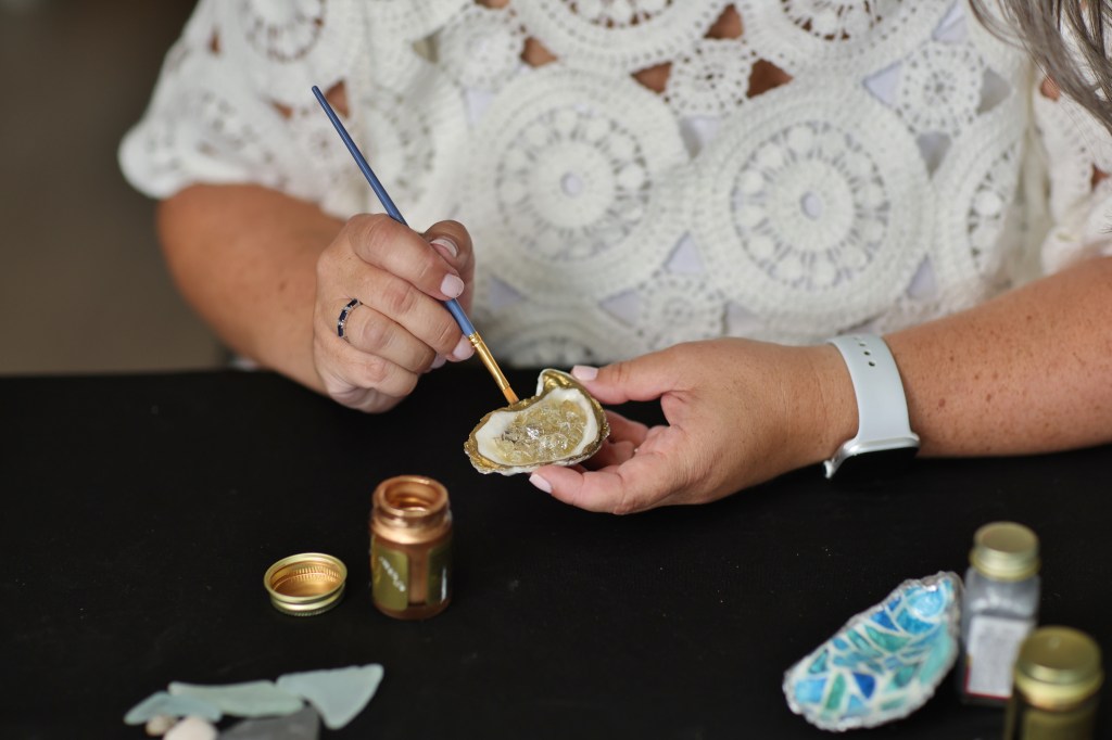 Di Rico working on a crystal oyster shell, one of her popular creations.