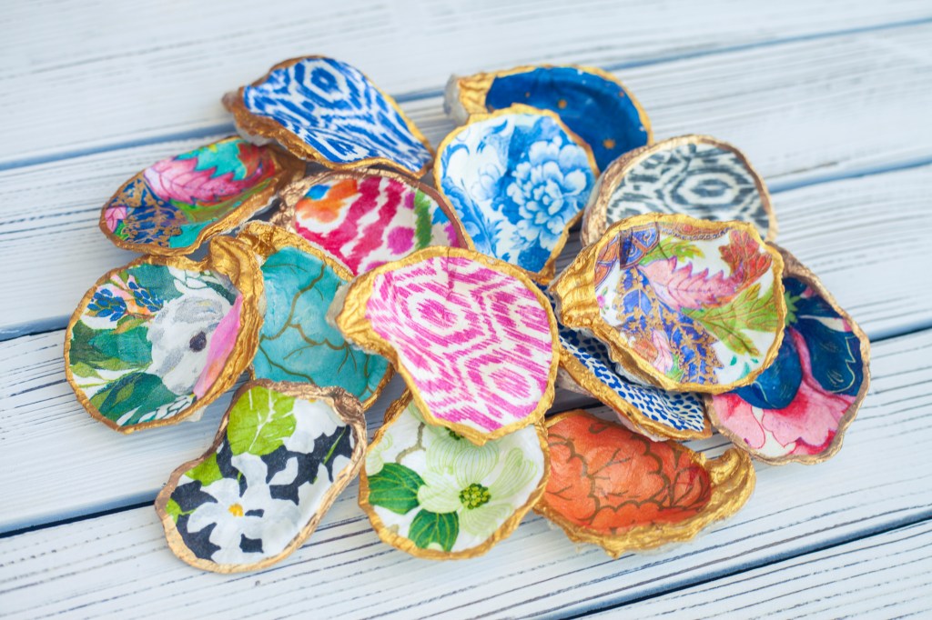 decoupage patterns inside of the oyster shells